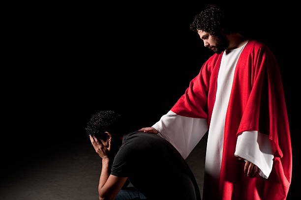 istock Worried man with Jesus behind him 182517023