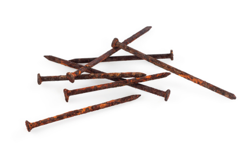 Rusty nails on a white background