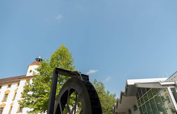 Kempten, Germany, September 8, 2023 Spinning wheel in a fountain in the city center