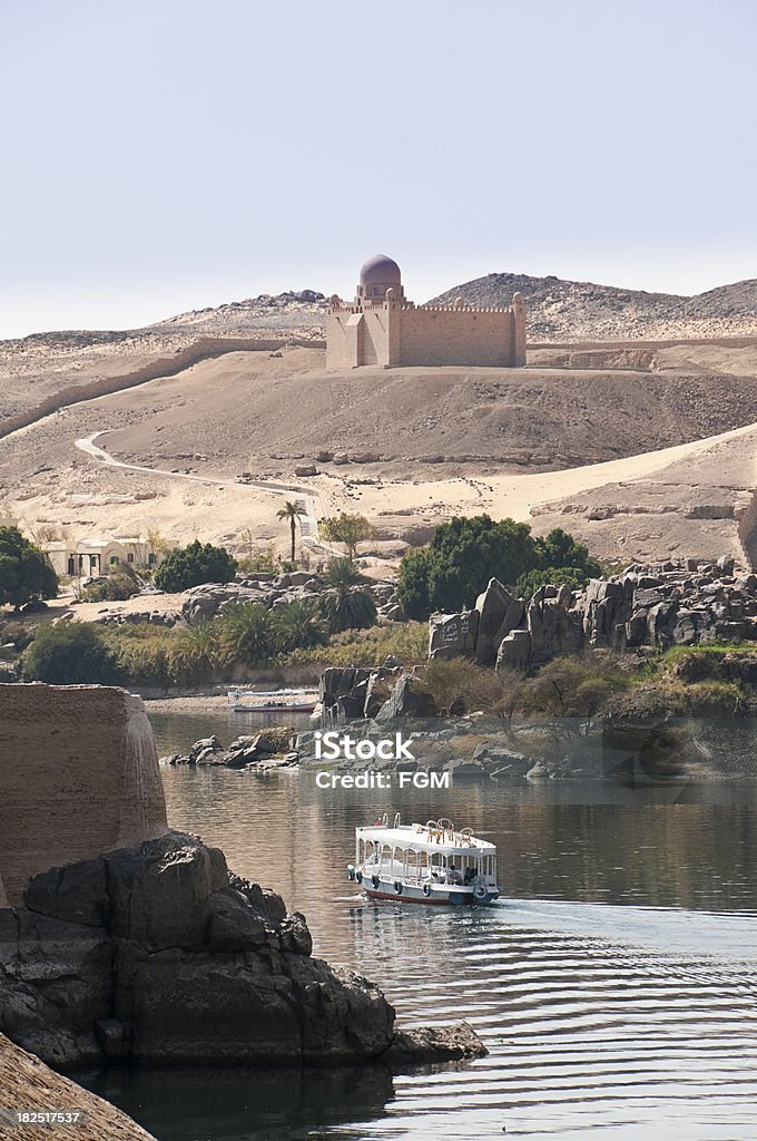 The Nile A small tour boat on the upper reaches of the Egyptian NIle at Aswan Ancient Civilization Stock Photo