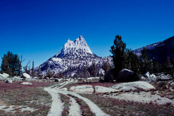 Hiking trail leading to Cathedral Peaks in Yosemite National Park high country.\n\nTaken in Yosemite National Park, California, USA