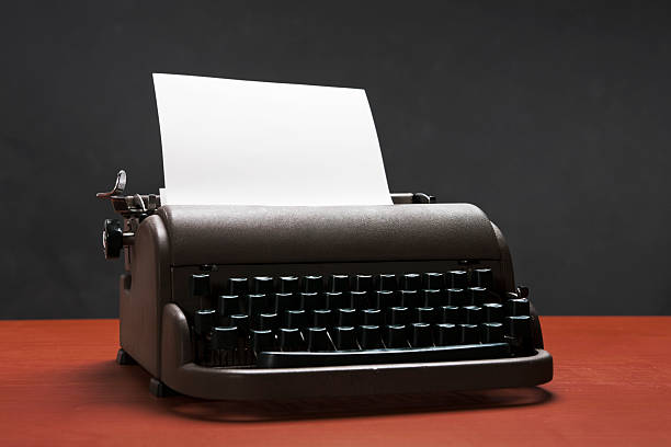 istock Old manual typewriter with blank paper for your message 182517894