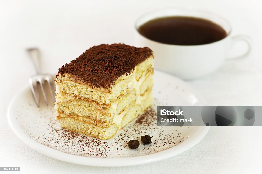 Tiramisu Tiramisu and cup of coffee. Baked Pastry Item Stock Photo