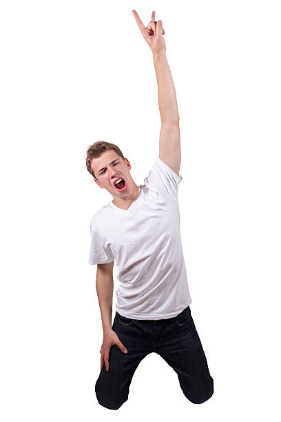 istock Casual male on his knees rocking out 182518311