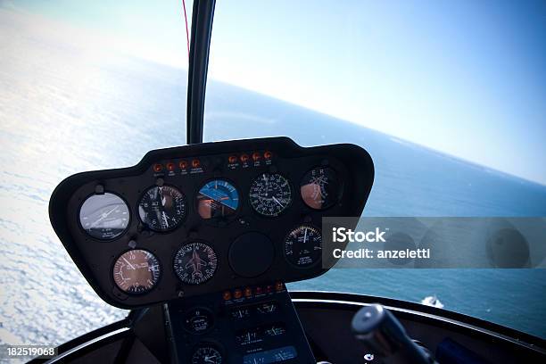 In A Helicopter Cockpit Flying Over The Sea Stock Photo - Download Image Now - Cockpit, Aerial View, Sea