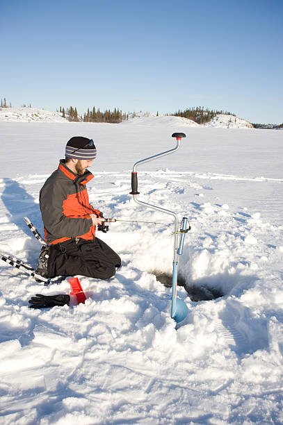 istock Ice Fishing, Yellowknife. 182519438