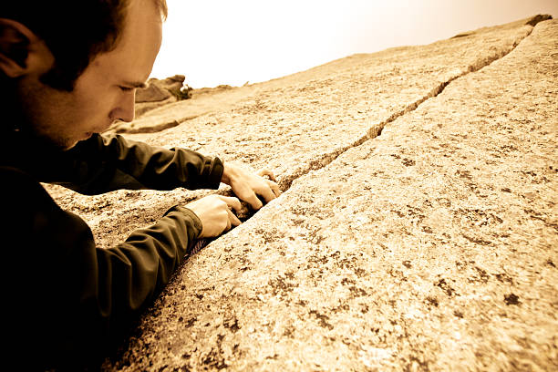 istock Young man leading a climbing route in Colorado 182519512