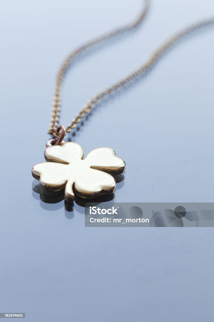 Golden shamrock necklace Pendant Stock Photo