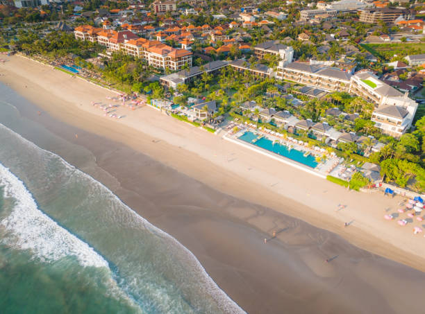 aerial view of seminyak beach coastline. kuta beach resort in bali, indonesia - kuta bildbanksfoton och bilder