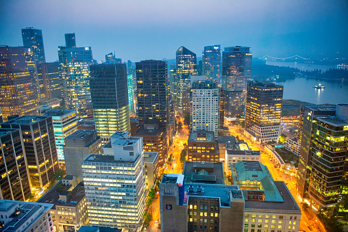 Downtown Vancouver City at night after sunset. Aerial Panorama. BC, Canada.
