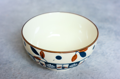 Empty ceramic bowl with motif