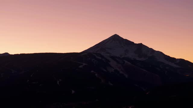 Panning shot of the beautiful lone mountain in Big Sky, Montana at dusk