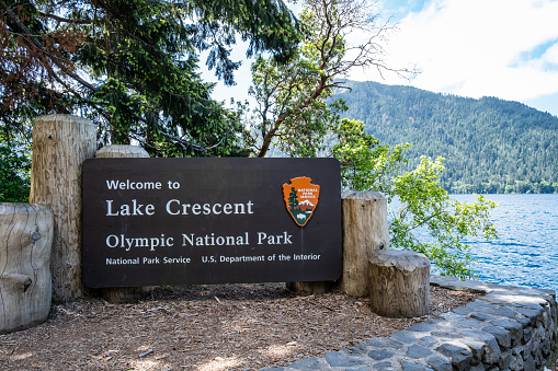 Clallam County, Washington - May 30, 2023: National Park Service sign welcoming visitors to Lake Crescent.