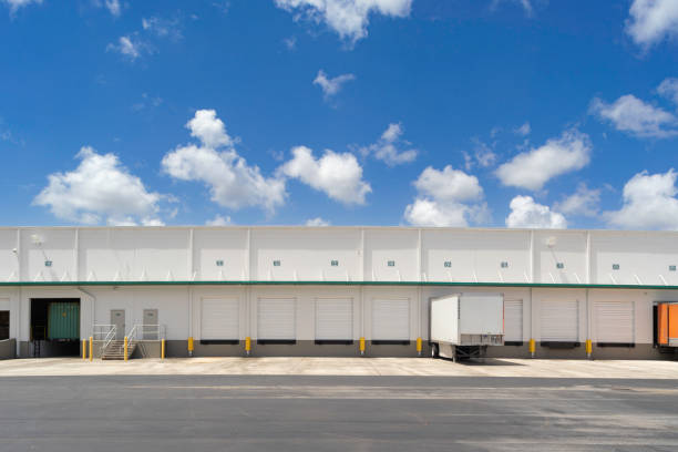 istock Trucks in loading dock of a warehouse. 1825339092