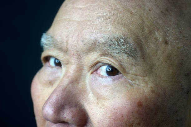 istock Close-up of senior's troubled face 1825367882