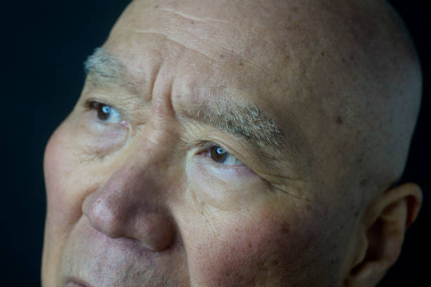 istock Close-up of senior's troubled face 1825368287