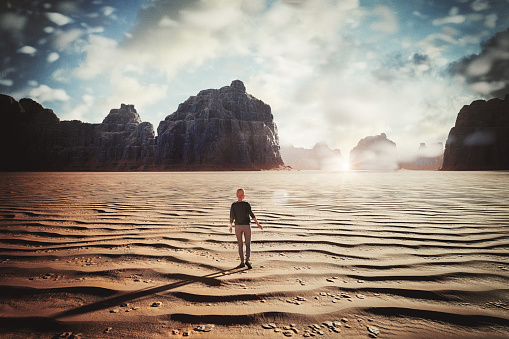 Woman walking in desert at sunset. 3D generated image.