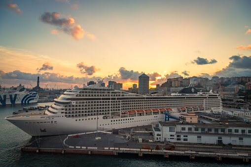 Sunset over MSC Orchestra Cruise Ship in Genoa, Italy