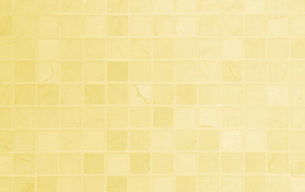 istock Yellow ceramic wall and floor tile abstract background. Design geometric gray mosaic texture decoration of the bedroom. Simple seamless pattern grid for backdrop hospital wall, canteen and kitchen. 1825505064