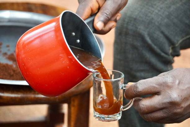istock Pouring Freshly Ground and Brewed Coffee 1825605565