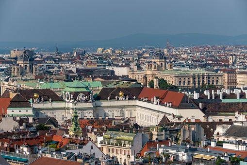 Aerial view of red roofs of sunny Vienna