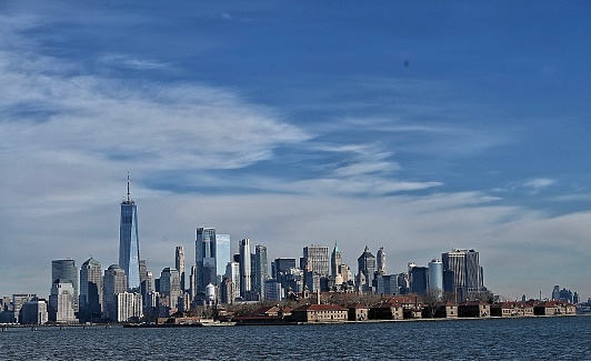 Cityscape of New York City, Ellis Island in the Hudson River,