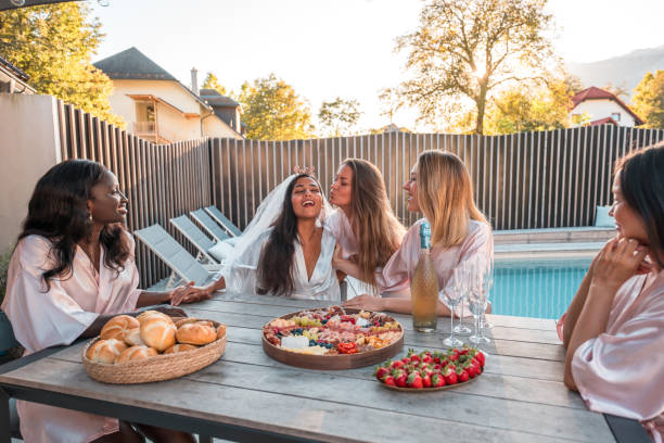istock Indian Bride’s Poolside Revelry with Diverse Friends 1825631542