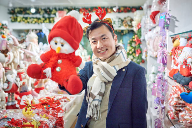 istock One Asian Male Display Christmas Toy Doll Facing the Camera 1825744435