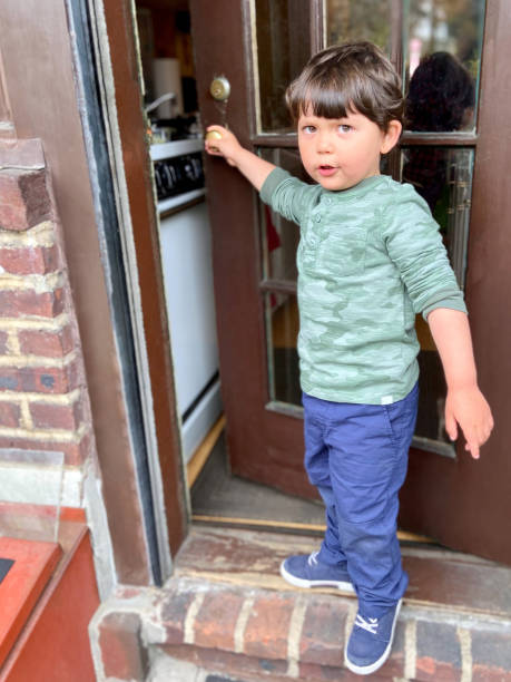 istock Toddler closing door 1825822943