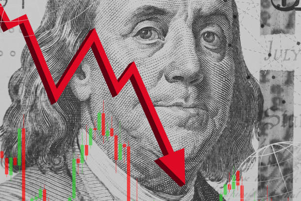 istock One hundred dollar bill background with red downward arrow. Economic crisis, devalue 1825843153