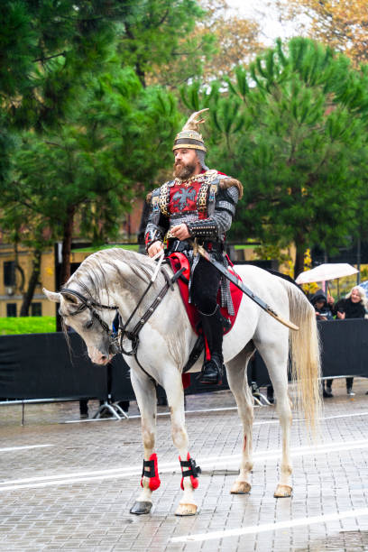 Albania independence day. Men dress in medieval armor with Skanderbeg helm  in main street in Tirana ( bulevardi Deshmoret e Kombit ) celebrated the independence day, 28.11.2023
