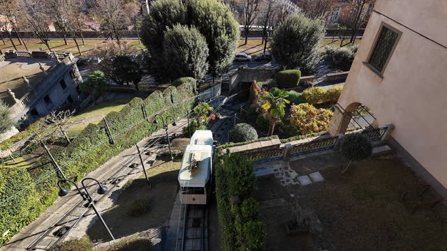 Bergamo, Italy. The Funicular from the lower city to the upper city. Scenic view from the venetian wall. It connects the new city with the old one for more 120 years