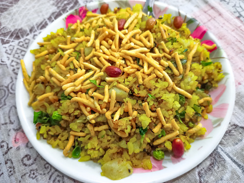 Flatten rice also known as poha is popular Indian snack, seasoned with veggies and rice. Poha is prepared with flattened rice. It is mainly served as breakfast in many States.