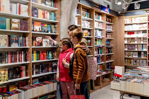 A bookstore becomes a haven of exploration and connection as a mother, her son, and daughter set out to choose books together