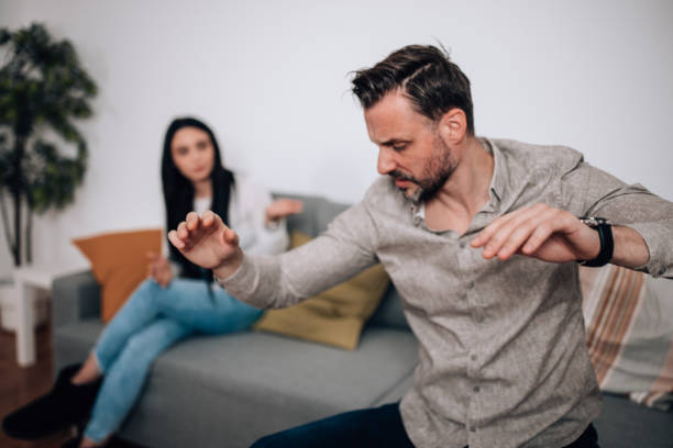 istock Mid Adult Man and Young Woman Arguing Over Personal Differences 1826156005