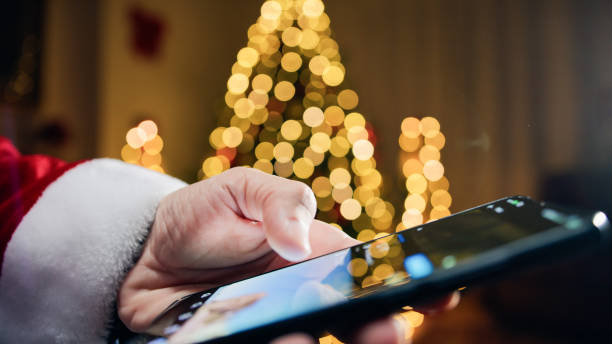 istock Santa Claus scrolling with smartphone on social media 1826194728