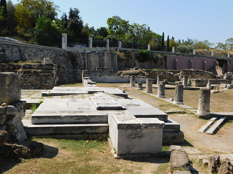 View of the archeological site of Keramikos. Ruins of the entrance to the Pompeion, an ancient public building related to the religious procession for goddess Athena