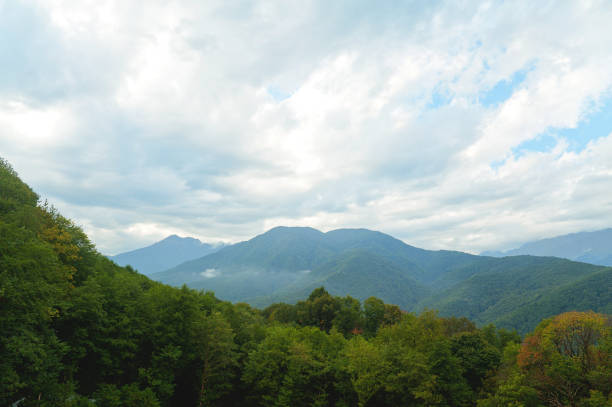 istock Beautiful view from the heights of mountains with clouds. 1826332183