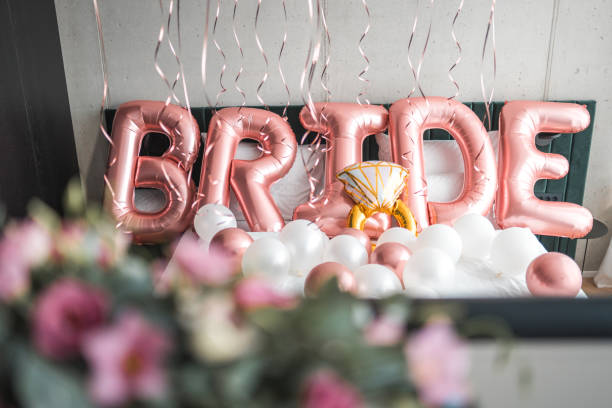 istock Bed Adorned with Charming Balloon Decorations in Hotel Room 1826357160