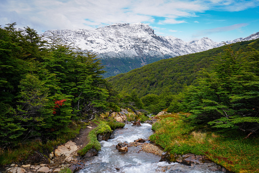 The mountains surrounding Ushuaia in Argentina are full of trails and beautiful streams that provide scenic views over the Tierra del Fuego.