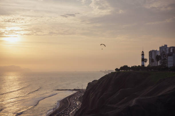 istock Paragliding over Lima's coast at Sunset 1826378453