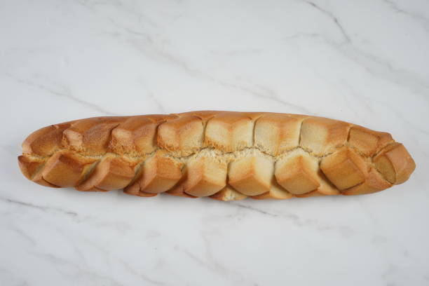 French baguette with garlic butter and aromatic herbs