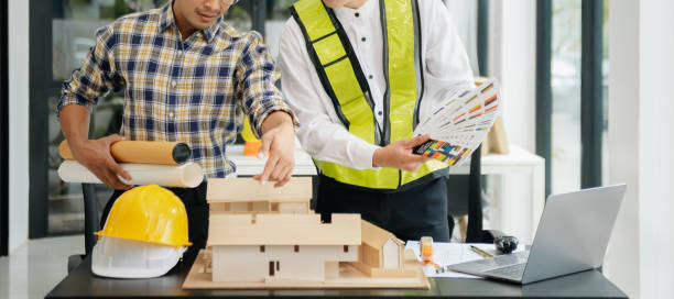istock Engineer Teamwork Meeting, Drawing working on blueprint meeting for project working with partner on model building at office. Asian industry professional team 1826409337