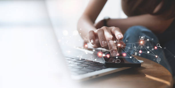 istock IoT Internet of Things, global business, e-commerce, digital marketing concept. Woman using mobile phone and laptop for online shopping and digital banking via mobile app, social media internet network connection 1826437171