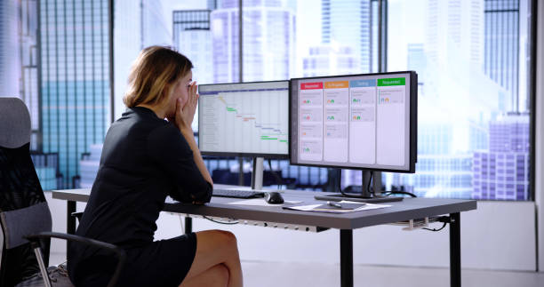 istock Frustrated Manager With Kanban Board and Gantt Chart 1826452233