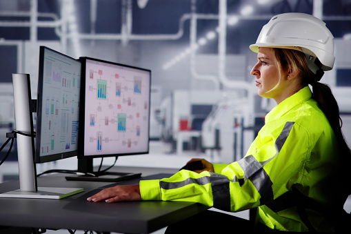 Engineer Operators Using Scada System At Industrial Plant