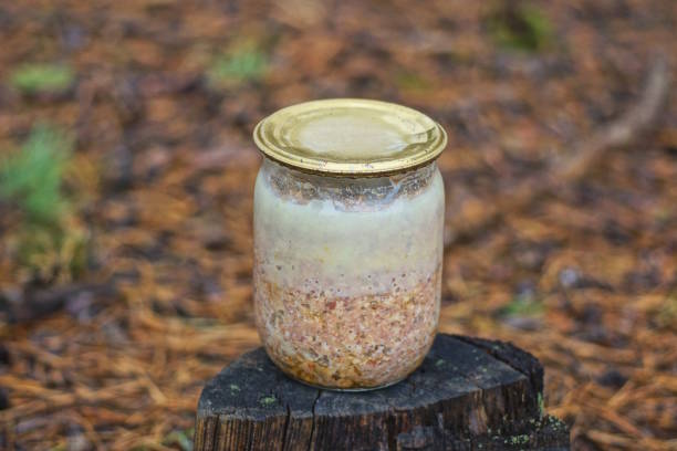 istock one glass jar with brown chicken stew 1826502333
