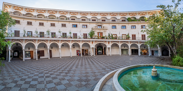 October 20, 2021 - Sevilla, Spain: Panorama of picturesque square plaza del Cabildo in the morning with his fountain, Seville, Andalusia, Spain