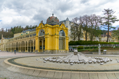 Marianske Lazne CZ - April 27. 2022 -  One of the three famous spa towns in the Czech Republic. Marianske Lazne, Franziske Lazne and Karlovy Vary. Marianske Lazne has many drinking fountains with mineral water, many spa hotels, a vast forest-like park and a singing fountain. Many tourists visit the town every day.