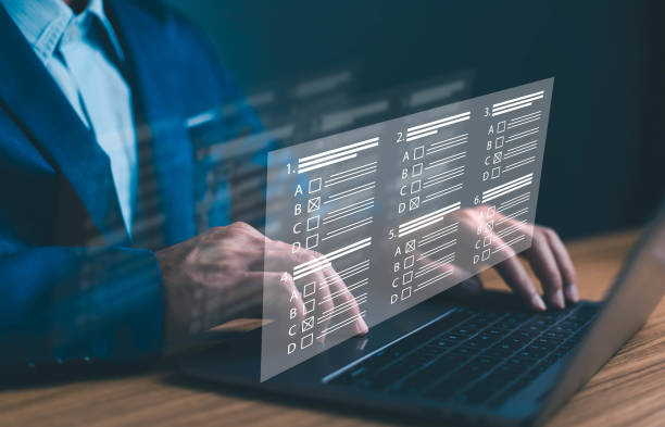 istock Survey form online questions knowledge test, research poll on computer internet website digital exam question result, online survey filling out an online survey form, answer the test questions. 1826544850